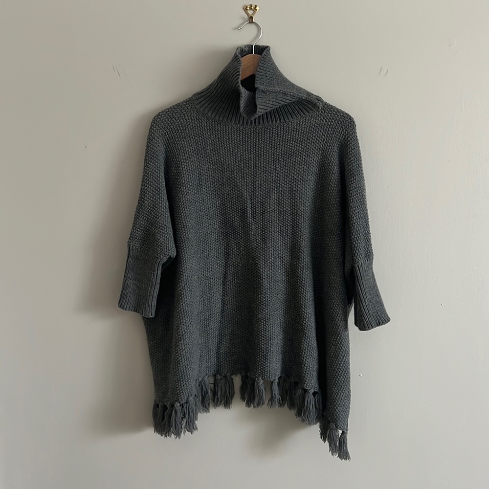 Anthropologie Sweater , tassel hem